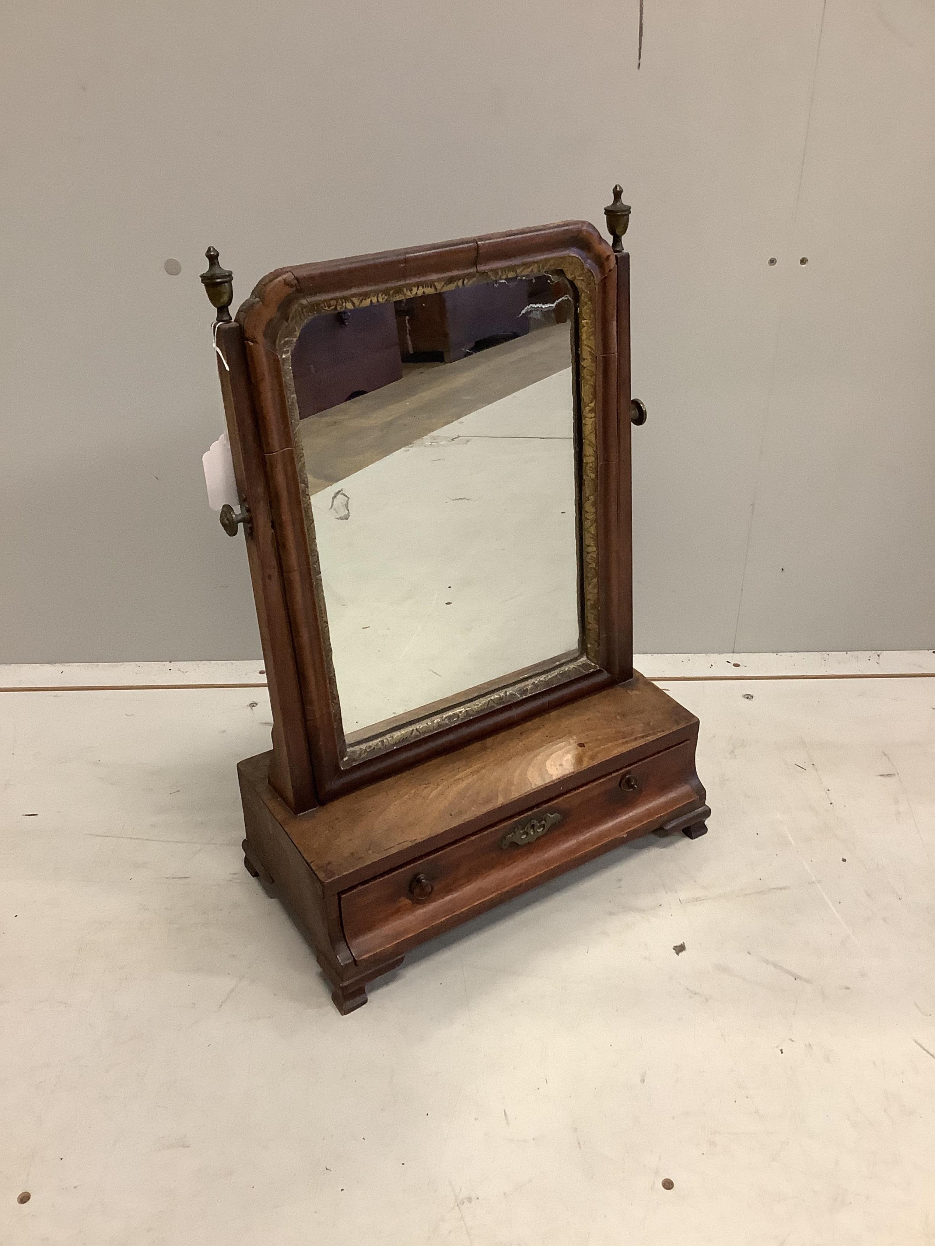 An 18th century walnut toilet mirror, height 43cm, an Edwardian inlaid fret cut wall mirror and an Edwards and Roberts mahogany wall bracket. Condition - fair to good.